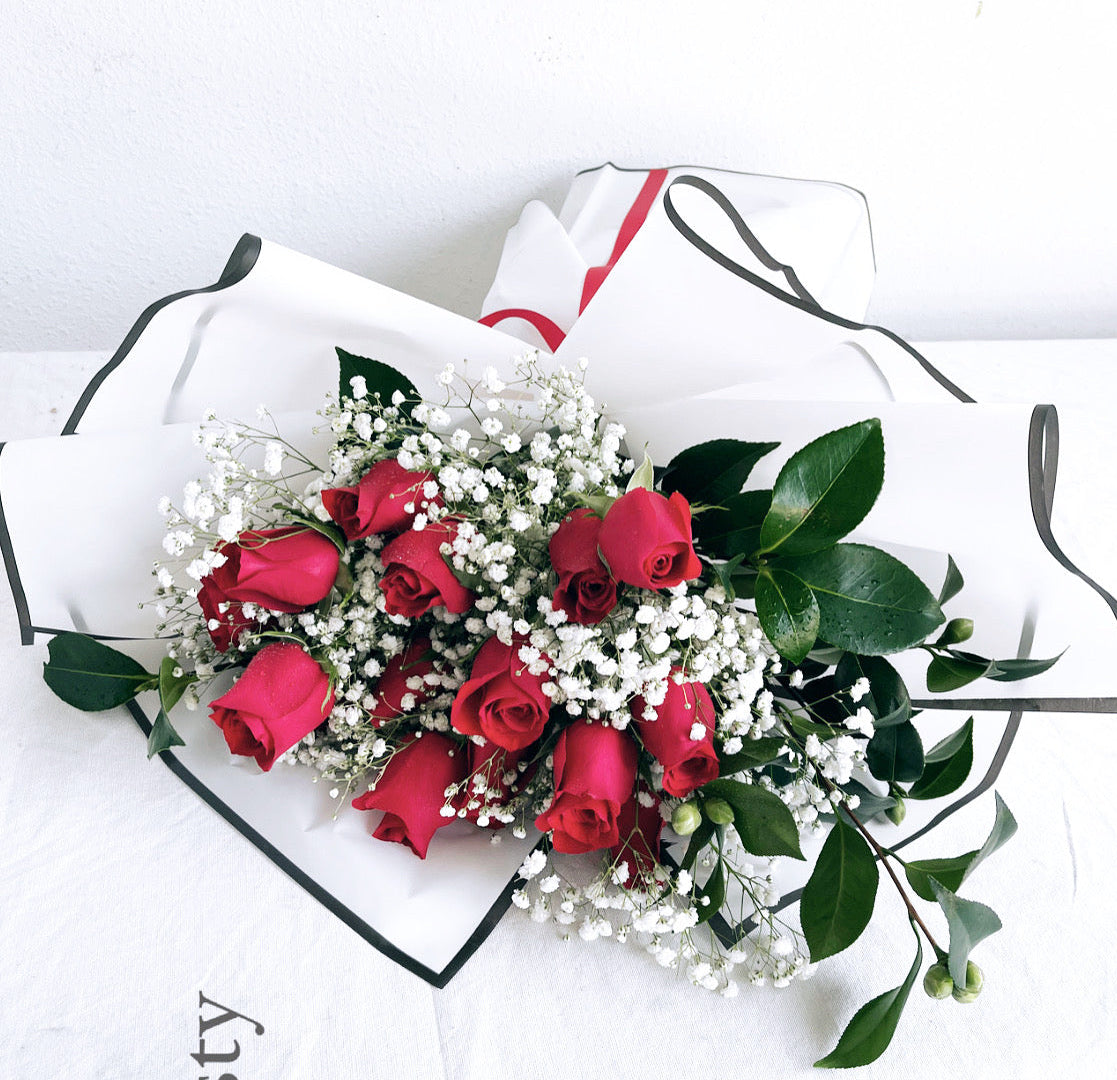 Valentine rose bouquet detail with baby’s breath