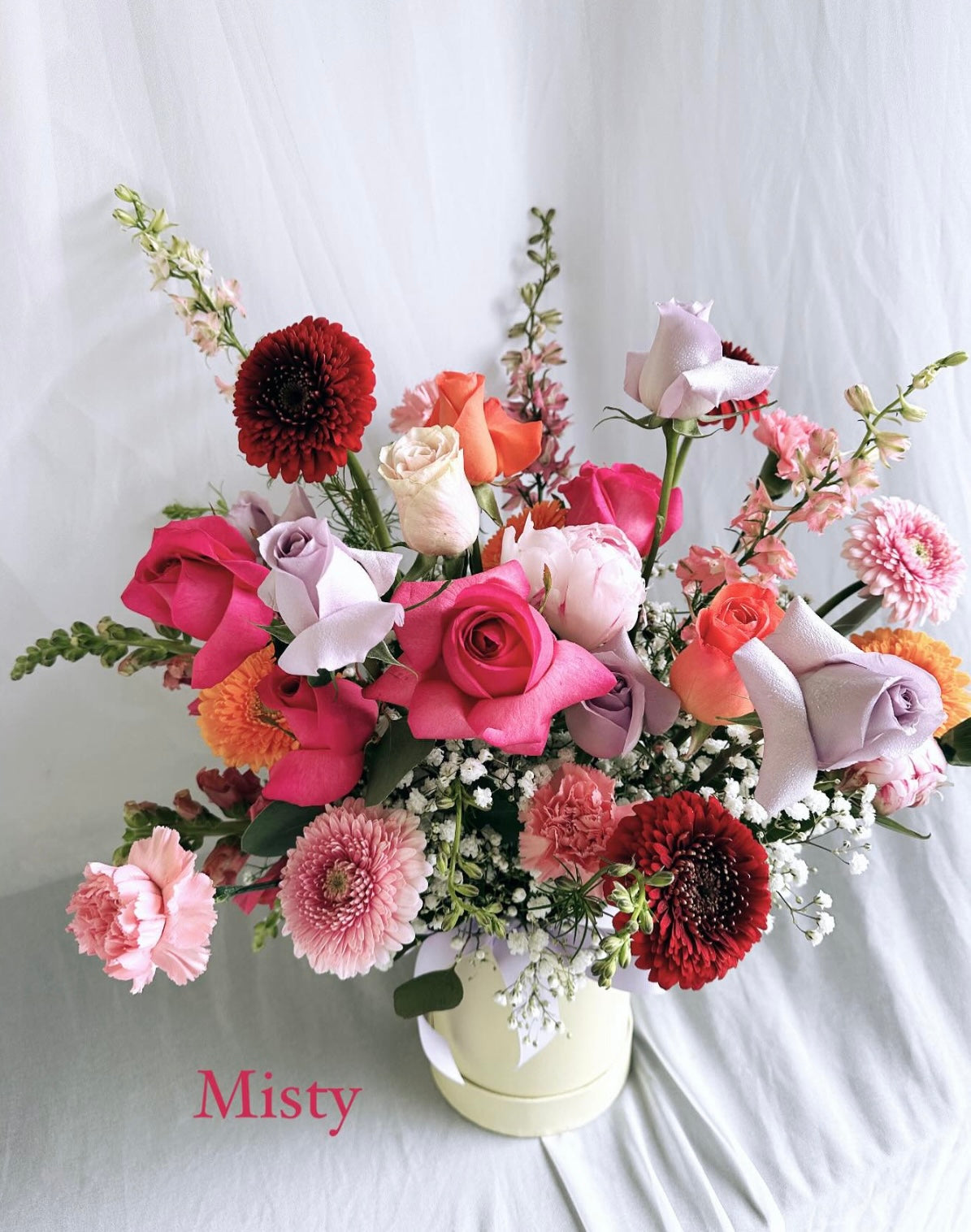 Modern style flower arrangement with seasonal flowers, luxury flower delivery in Vancouver 